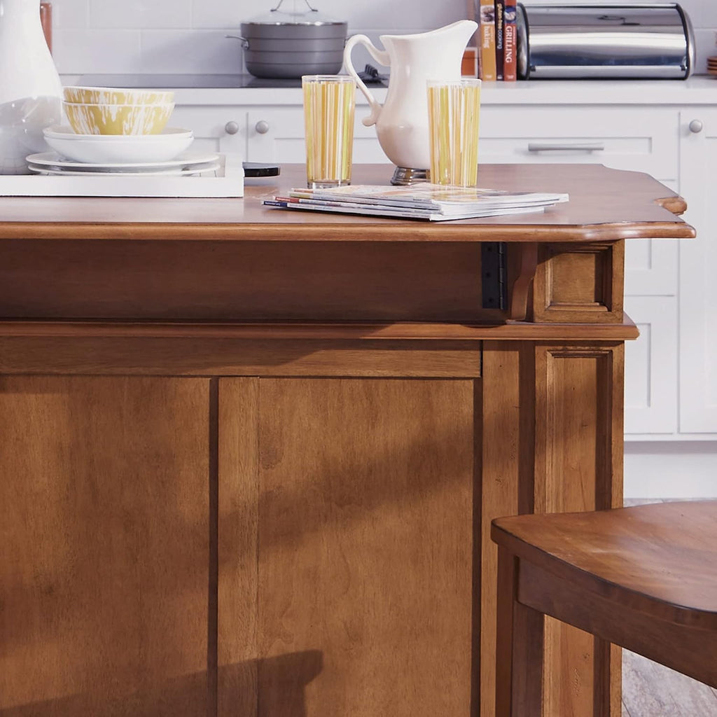Homestyles Americana Cottage Oak 3-Piece Kitchen Island Set with Hardwood Drop Leaf Top and Two Counter Stools