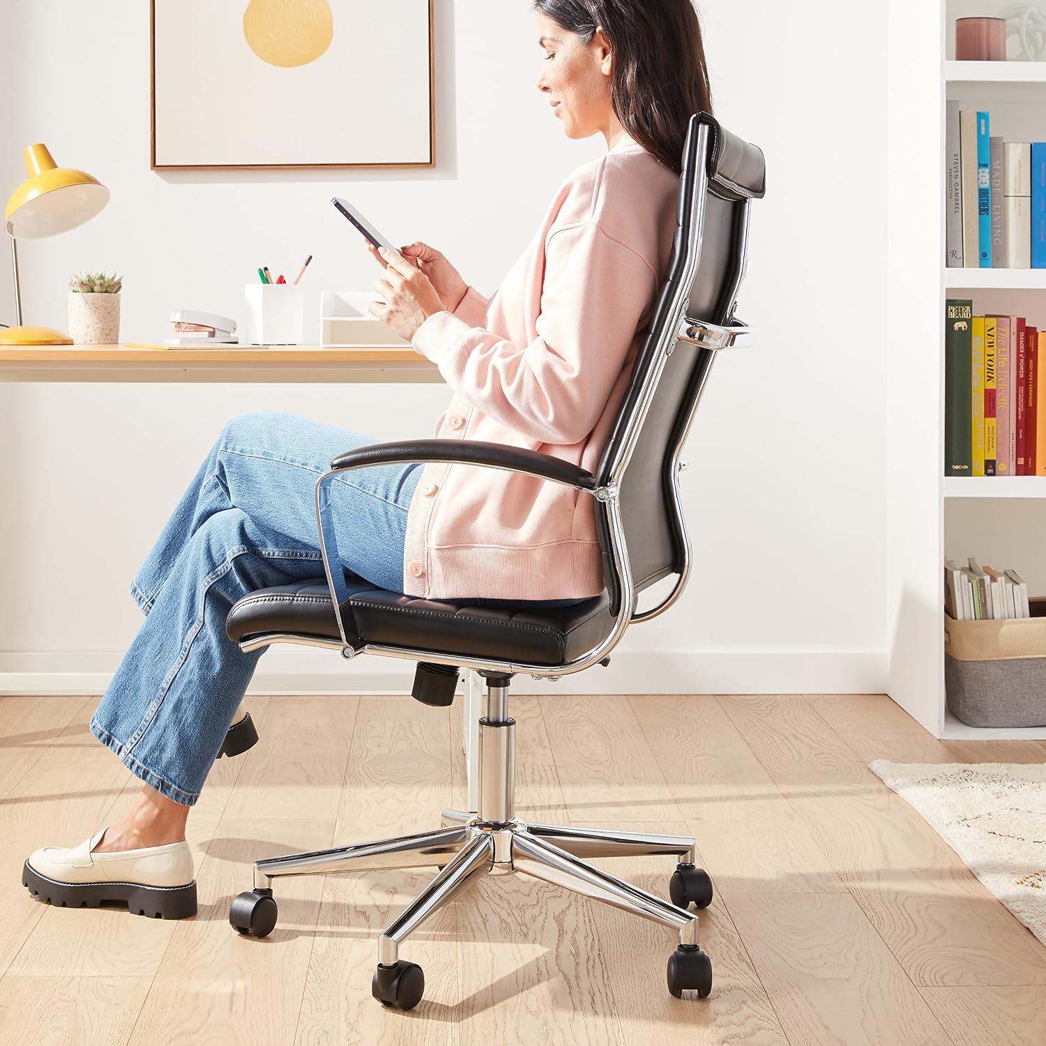 Amazon Basics High-Back Swivel Office Chair with Lumbar Support, Ergonomic Ribbed Faux Leather, Adjustable Height, 45.25' x 24.75' x 23.25', Black